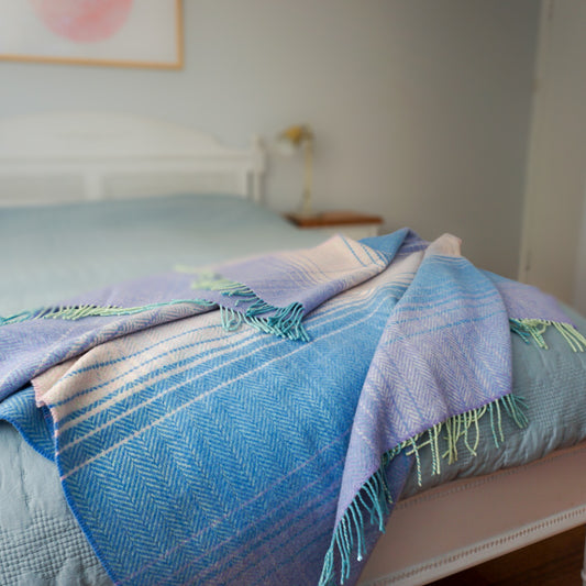 Cashmere Throw Cream Lilac Blue Herringbone on bed